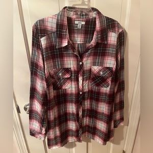 Long sleeve plaid button down shirt.